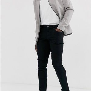 ASOS DESIGN Tall slim jeans in black